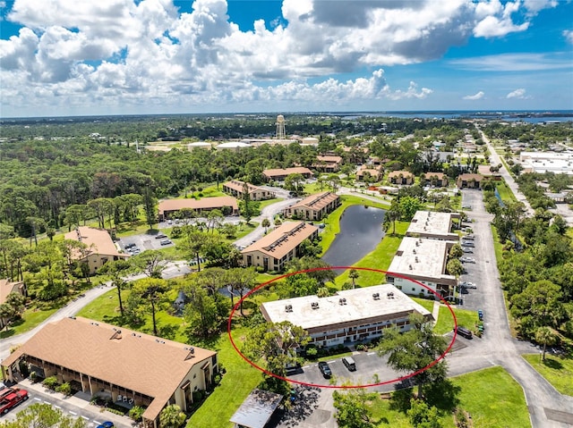 3 Quails Run Blvd Unit 8, Englewood, FL 34223 - birds eye view of property with a water view
