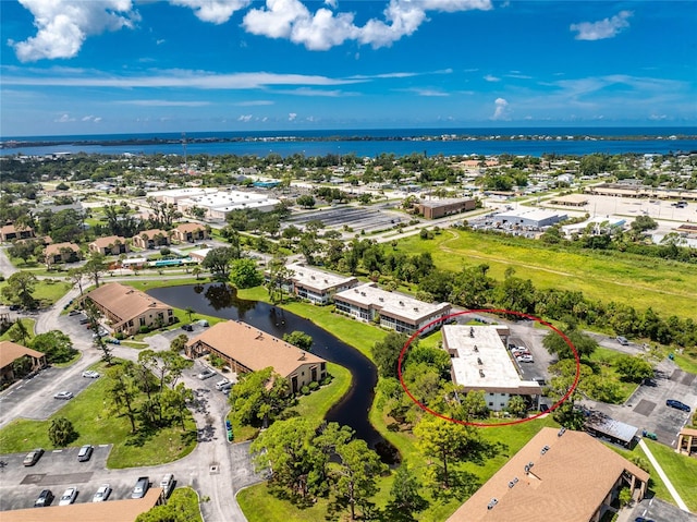 3 Quails Run Blvd Unit 8, Englewood, FL 34223 - birds eye view of property with a water view
