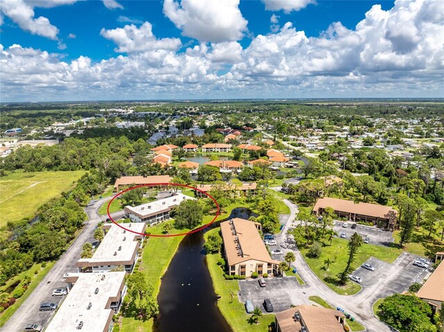 3 Quails Run Blvd Unit 8, Englewood, FL 34223 - bird's eye view with a water view