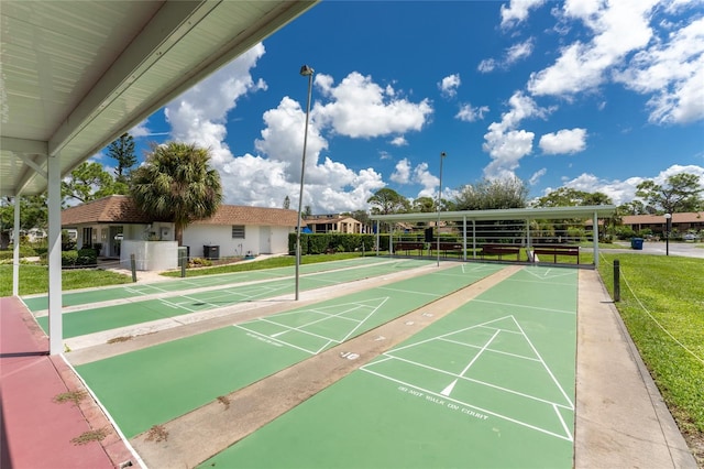 3 Quails Run Blvd Unit 8, Englewood, FL 34223 - view of property's community with shuffleboard