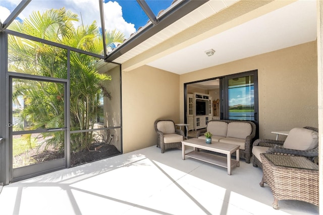 view of patio / terrace featuring a lanai and outdoor lounge area