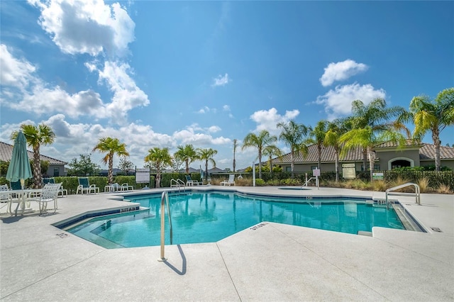 view of pool featuring a patio area