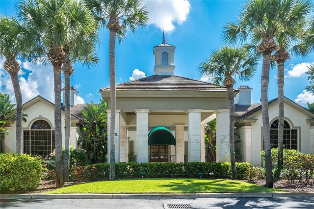 exterior space with a front lawn