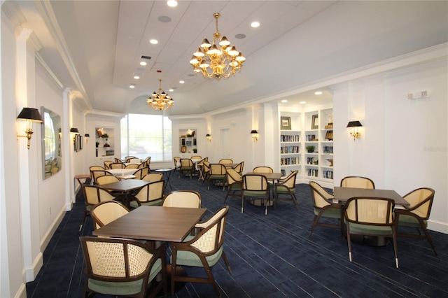 dining space with recessed lighting, wood finished floors, baseboards, ornamental molding, and a raised ceiling