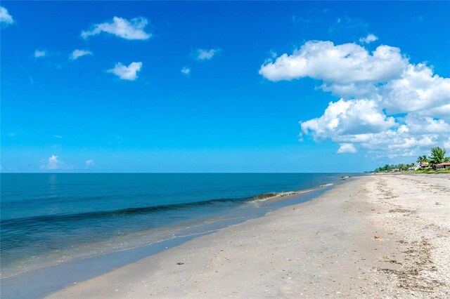 property view of water featuring a beach view