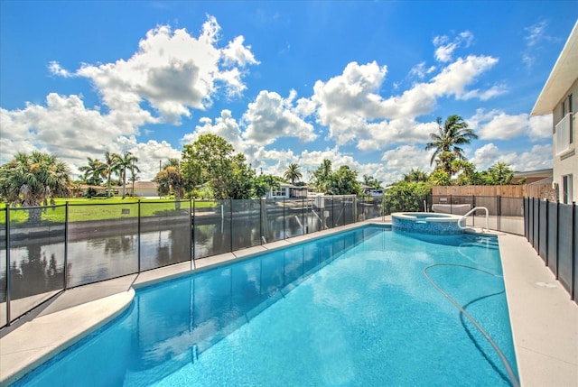 view of pool featuring a water view