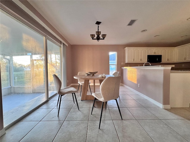 tiled dining space with sink