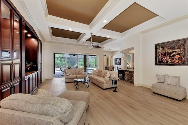 living room featuring coffered ceiling, beamed ceiling, ornamental molding, ceiling fan, and light wood-type flooring