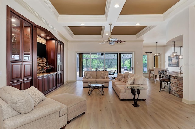 living room featuring light hardwood / wood-style flooring, coffered ceiling, ceiling fan, beam ceiling, and ornamental molding