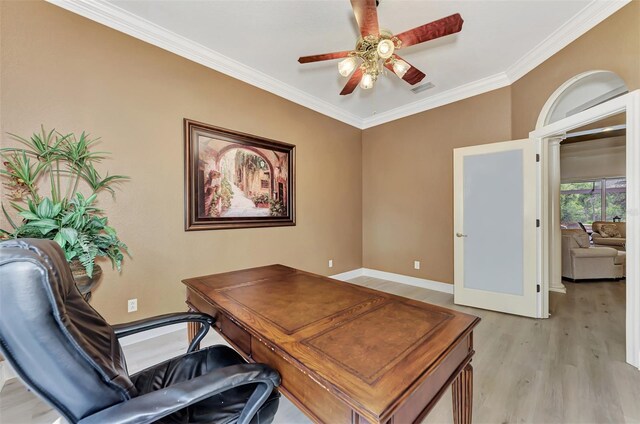 office space with light hardwood / wood-style flooring, ceiling fan, and ornamental molding