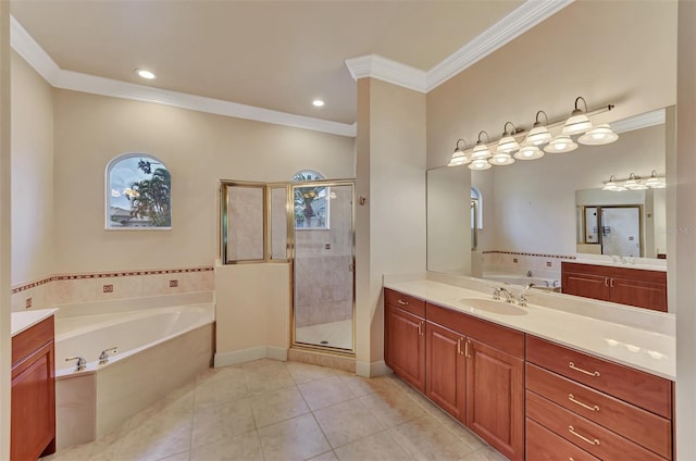 bathroom featuring tile patterned floors, independent shower and bath, ornamental molding, and vanity