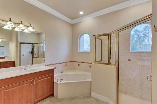 bathroom featuring tile patterned flooring, vanity, separate shower and tub, and ornamental molding