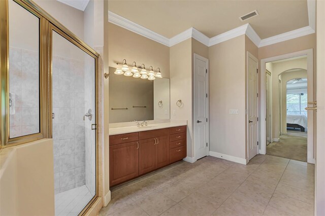 bathroom with a shower with door, ornamental molding, and vanity