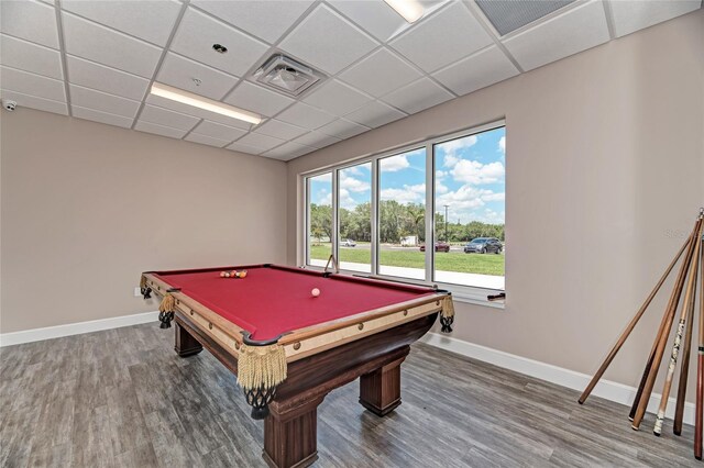 recreation room featuring hardwood / wood-style floors, a paneled ceiling, and pool table