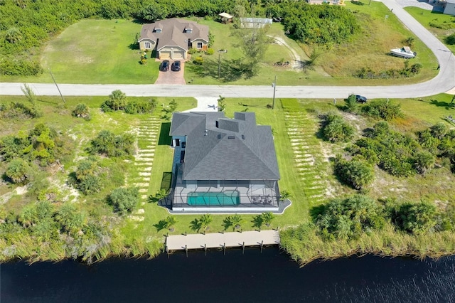 bird's eye view with a water view