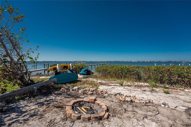 water view with an outdoor fire pit