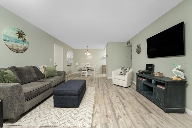 living room with light hardwood / wood-style floors