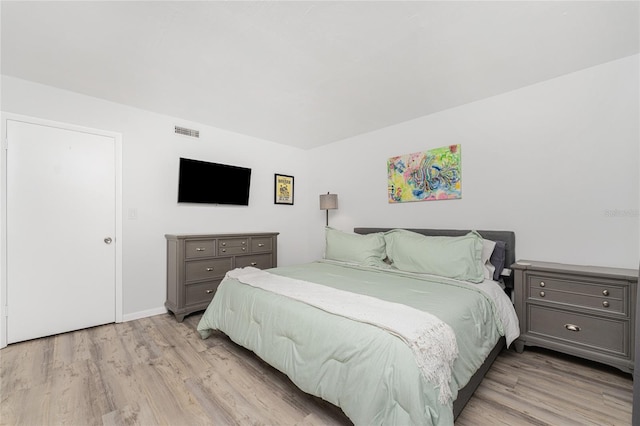 bedroom featuring light wood-type flooring