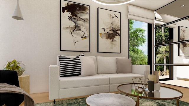 living room with plenty of natural light and hardwood / wood-style flooring