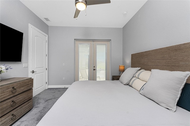 bedroom featuring access to outside, carpet flooring, ceiling fan, and french doors