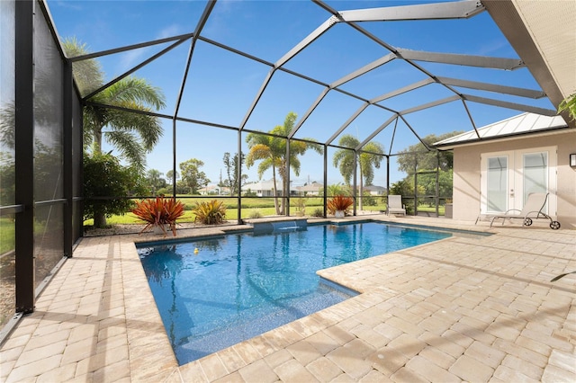 view of pool featuring a lanai and a patio