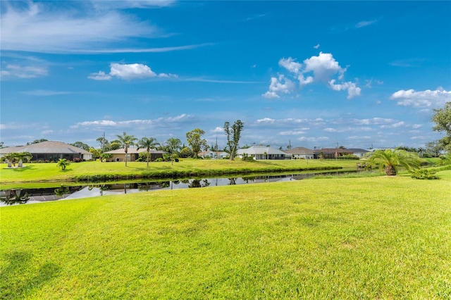 view of yard featuring a water view