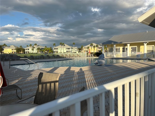 view of swimming pool featuring a patio