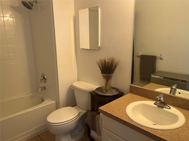 full bathroom with vanity, tiled shower / bath combo, toilet, and tile patterned floors