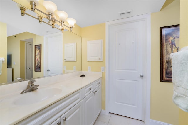 bathroom with vanity and tile patterned floors