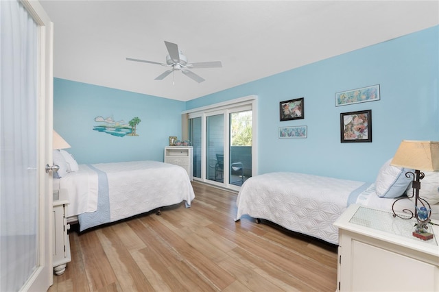 bedroom with wood-type flooring, access to exterior, and ceiling fan