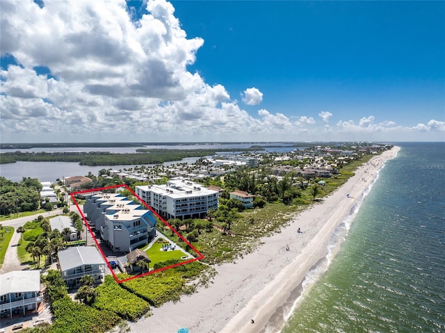 aerial view featuring a beach view and a water view