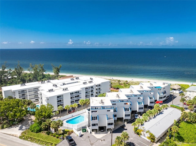 aerial view featuring a beach view and a water view