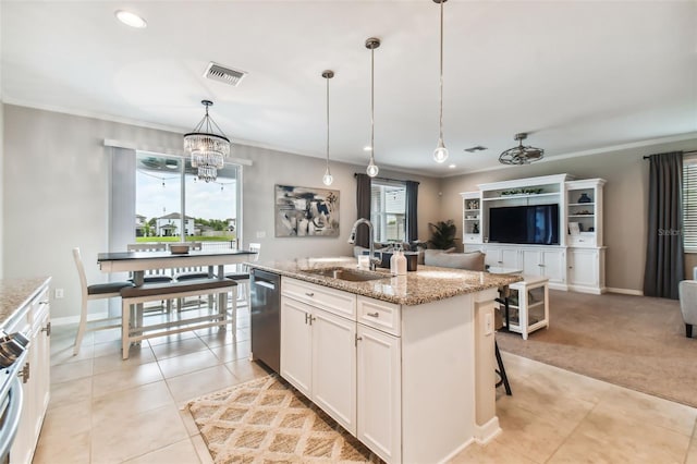 kitchen with ornamental molding, a sink, open floor plan, light tile patterned floors, and dishwasher