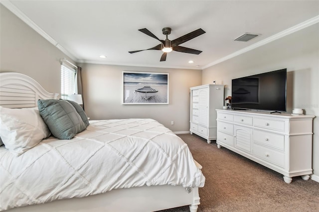 bedroom with crown molding, baseboards, visible vents, and dark colored carpet