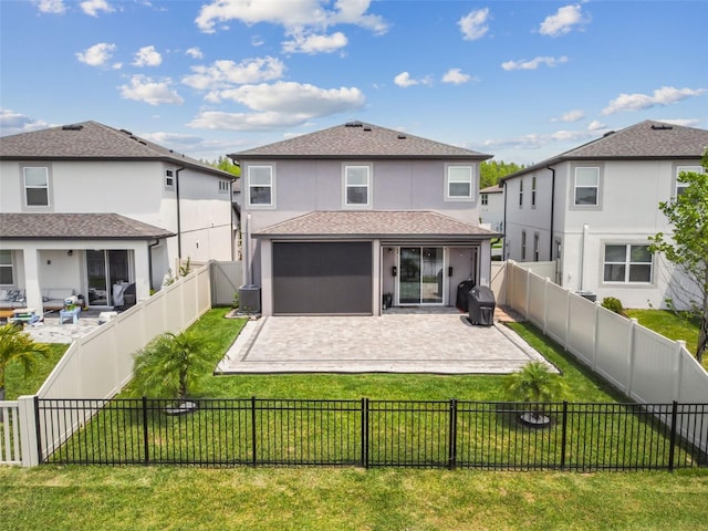 back of property featuring a lawn, cooling unit, stucco siding, a fenced backyard, and a patio area