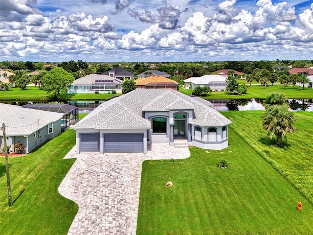 drone / aerial view featuring a water view