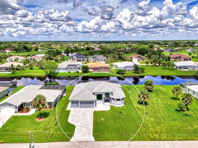 drone / aerial view with a water view