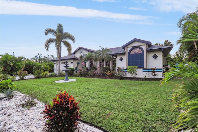 view of front facade with a front lawn