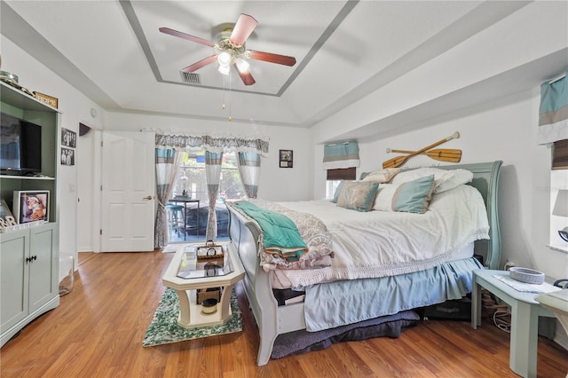 bedroom with light wood-type flooring and ceiling fan