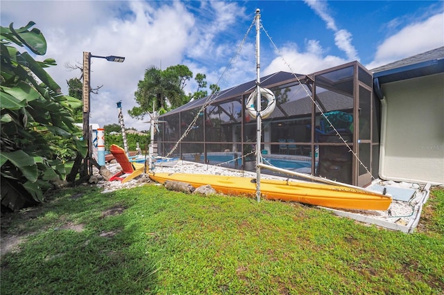 view of yard featuring a lanai