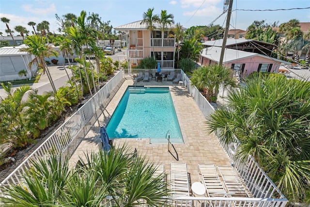 view of pool featuring a patio area