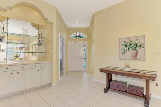 view of tiled foyer entrance