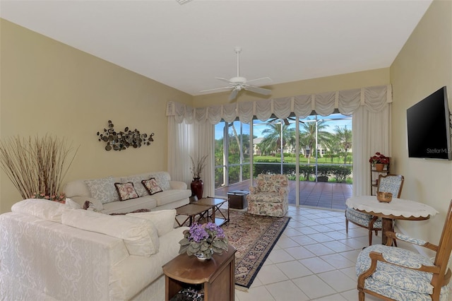 living room featuring ceiling fan and light tile patterned floors