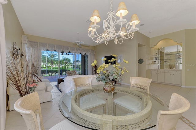 dining area with ceiling fan with notable chandelier and light tile patterned flooring