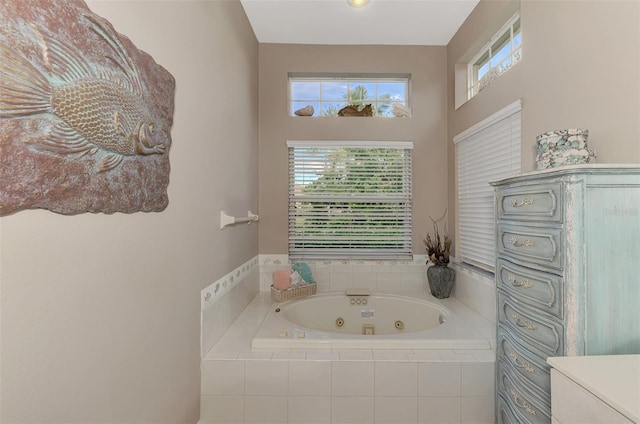 bathroom with tiled tub