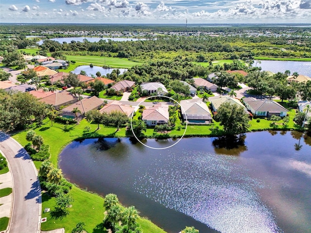 drone / aerial view with a water view