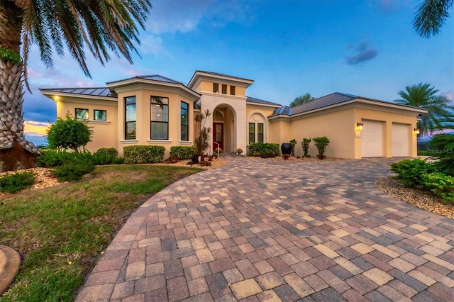 view of front of house with a garage