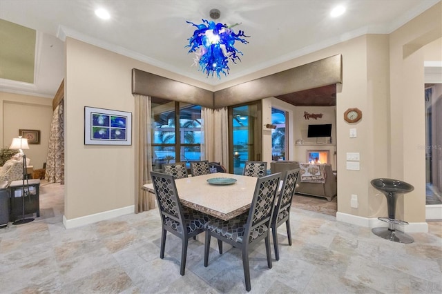 dining space with crown molding