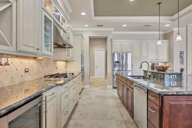 kitchen featuring wine cooler, hanging light fixtures, white cabinetry, stainless steel appliances, and dark stone counters