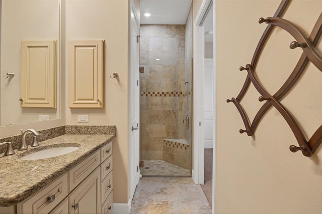 bathroom with vanity and an enclosed shower